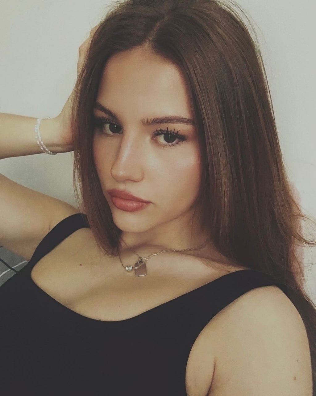 Captivating Brunette Beauty Captivating brunette beauty with alluring gaze and plump lips