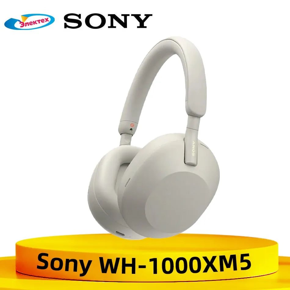 Беспроводные наушники Sony WH-1000XM5 на желтом подиуме Гладкие белые наушники Sony WH-1000XM5, представленные на ярко-желтом пьедестале, демонстрируют свой современный дизайн и превосходные аудиовозможности. Эти беспроводные накладные наушники обеспечивают высококачественный звук и комфорт для полного погружения в прослушивание.