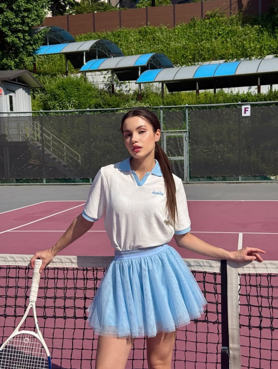 Sultry Babe of the Tennis Court Sultry beauty showing off her athletic physique on the tennis court, ready for some intense action in her cute sporty attire and ready to pleasure.