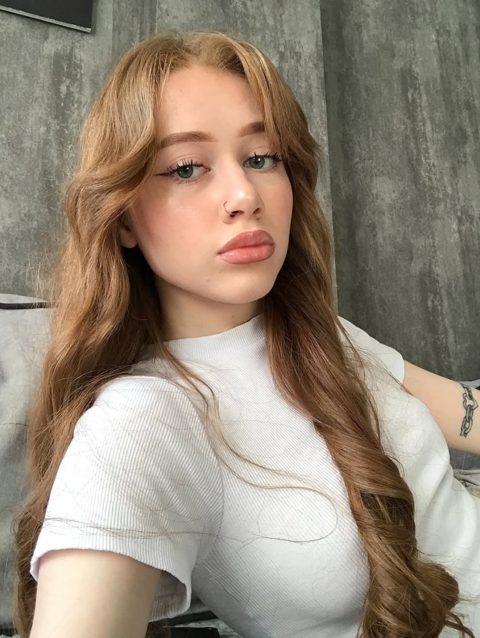 Sultry Redhead with Piercing Gaze Sultry Redhead Beauty with Piercing Gaze and Plump Lips